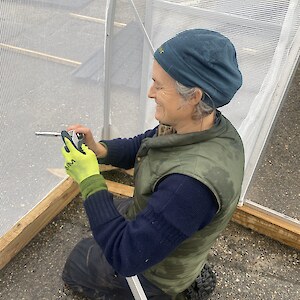 Jesse re-assembing the grow tunnel